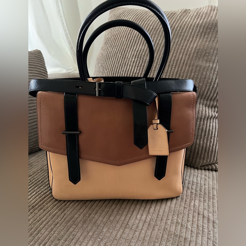 Reed Krakoff Authentic brown/black leathers bag in excellent condition.
